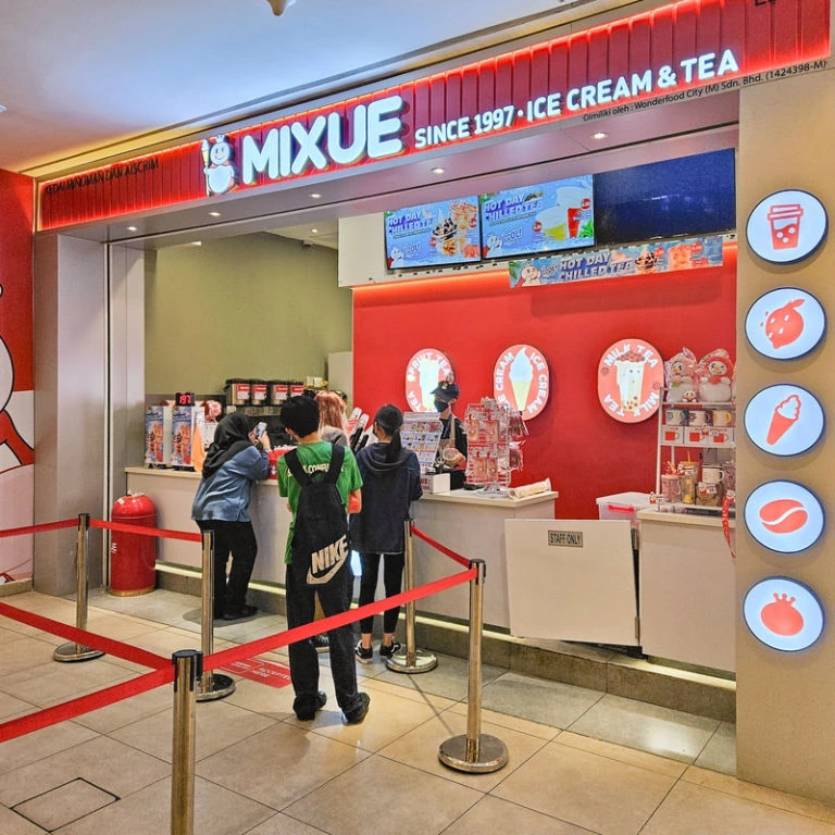 Mixue outlets Malaysia storefront in a shopping mall with ice cream and tea counter